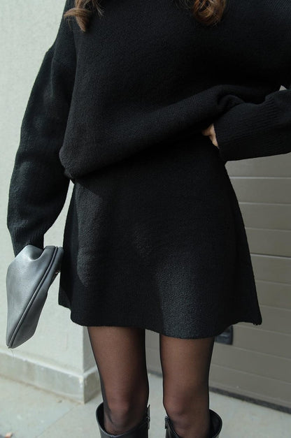 Comfortabele gebreide set van hoogwaardige materialen voor de herfst